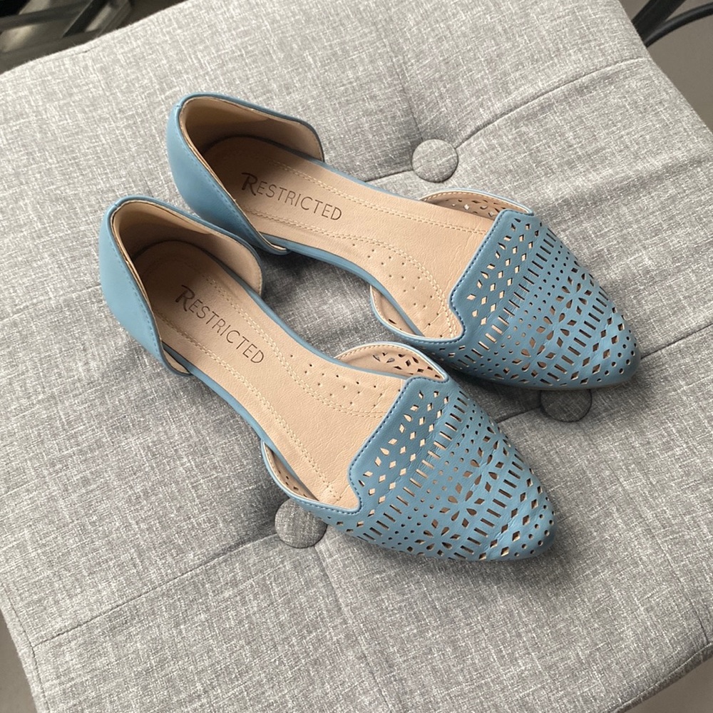 Blue flats. Size 7. Worn only once.